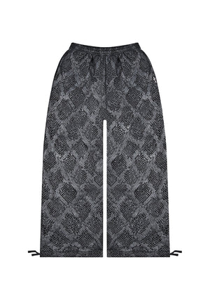 NOCTURNAL SNAKESKIN TEXTURED OVERSIZED SWEATPANTS BLACK