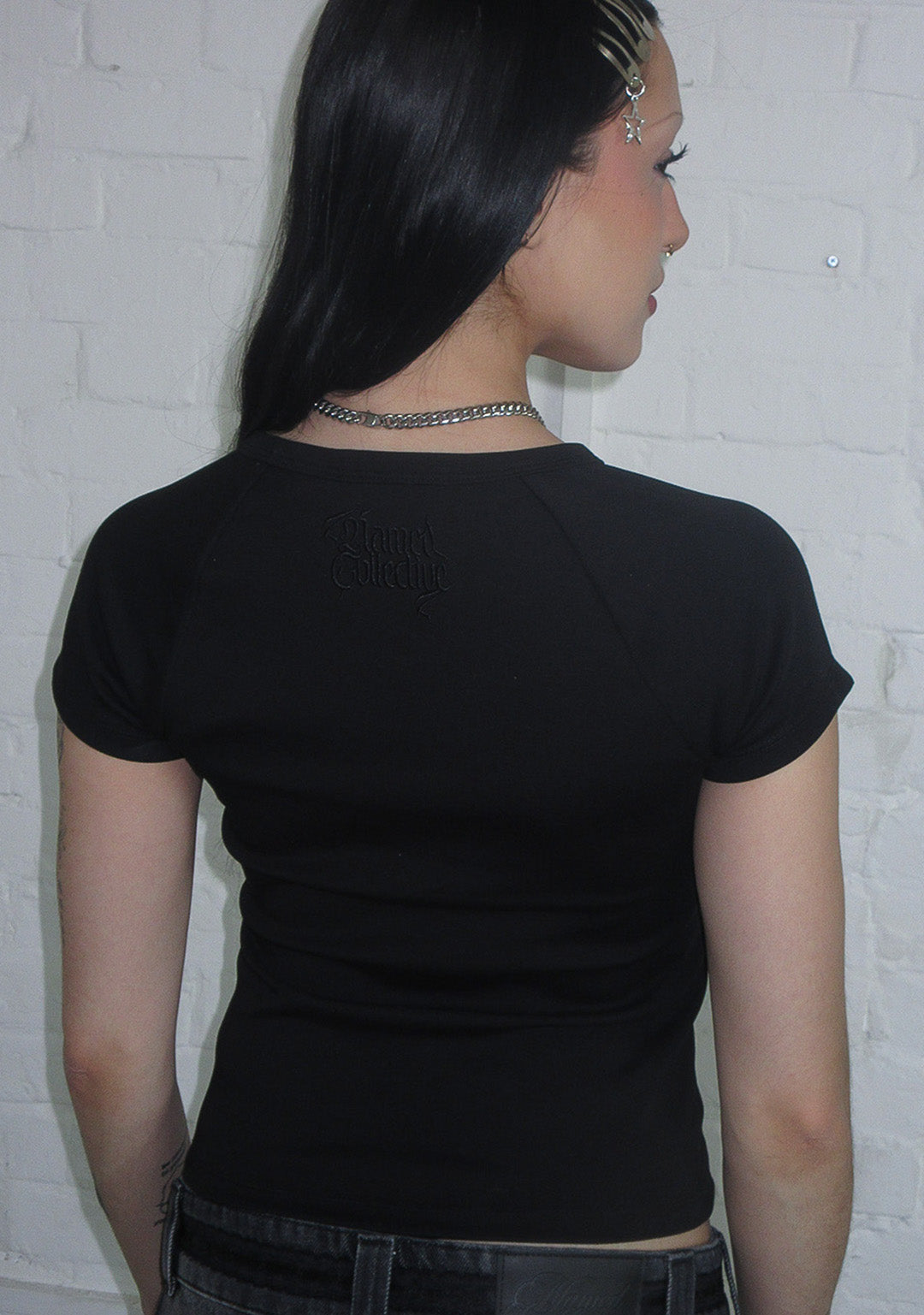 NOCTURNAL RHINESTONE BOW BABY TEE BLACK