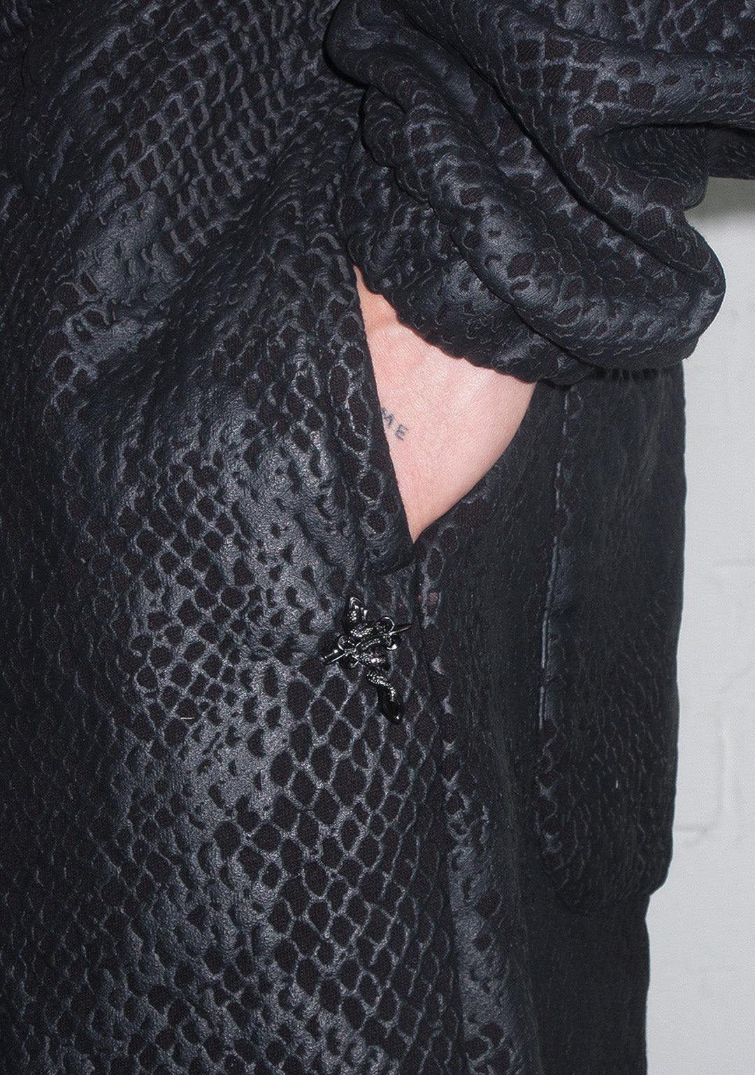 NOCTURNAL SNAKESKIN TEXTURED OVERSIZED SWEATPANTS BLACK