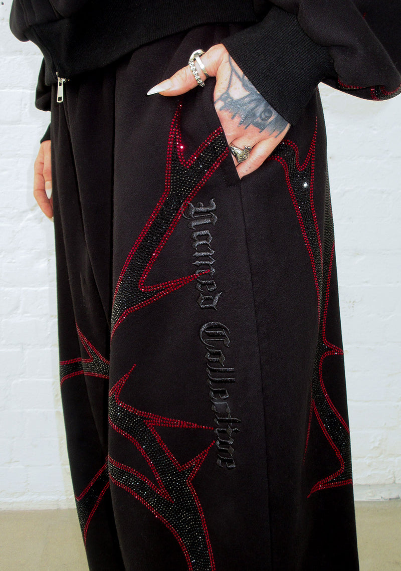THORN RHINESTONE SWEATPANTS BLACK AND RED
