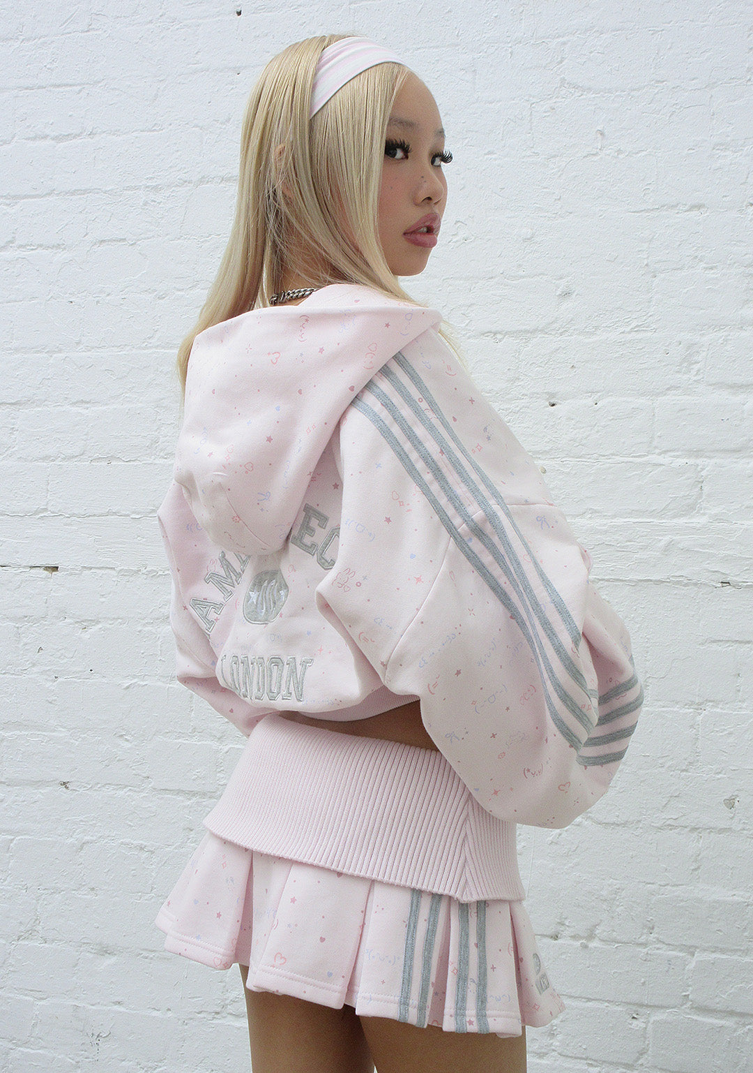 TREASURE PLEATED MINI SKIRT BABY PINK