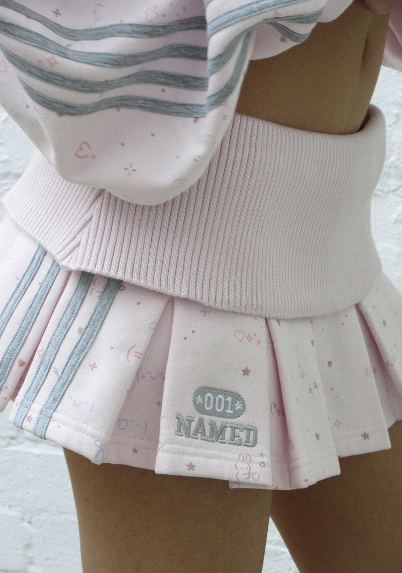 TREASURE PLEATED MINI SKIRT BABY PINK